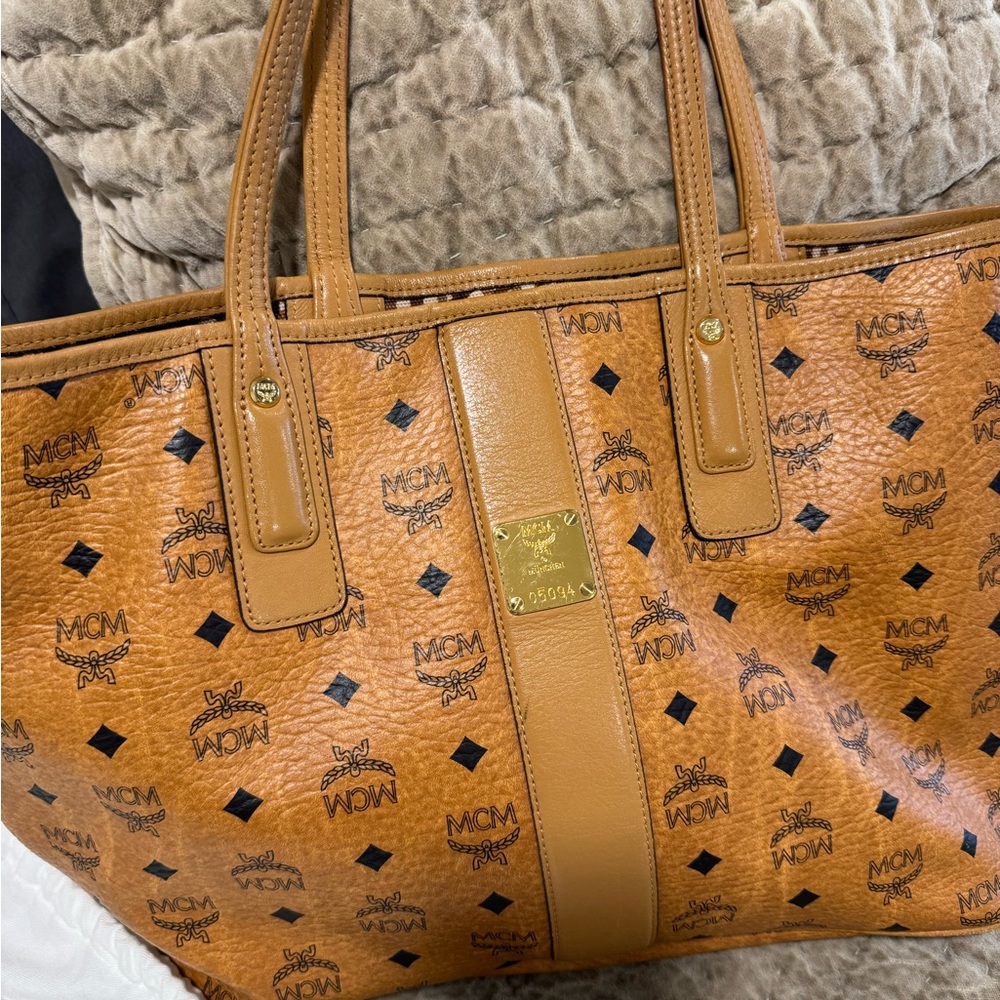 MCM Tan Tote with Gold Accents. In great condition. Gently used.